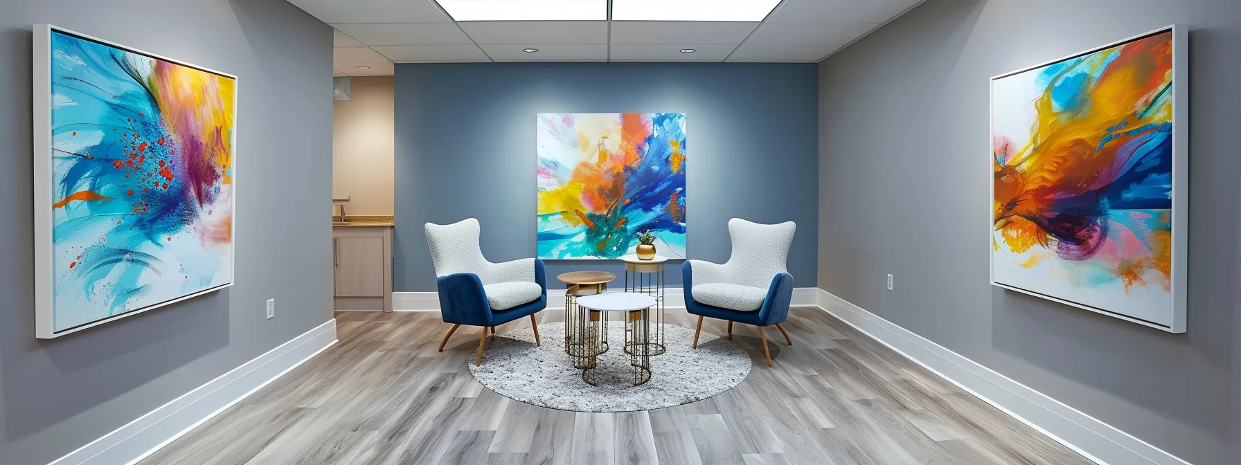 a focused, modern therapy room with a comfortable seating area and vibrant, abstract artwork on the walls, symbolizing mental health and recovery, while a soothing palette of blues and pastels creates an atmosphere of hope and serenity.